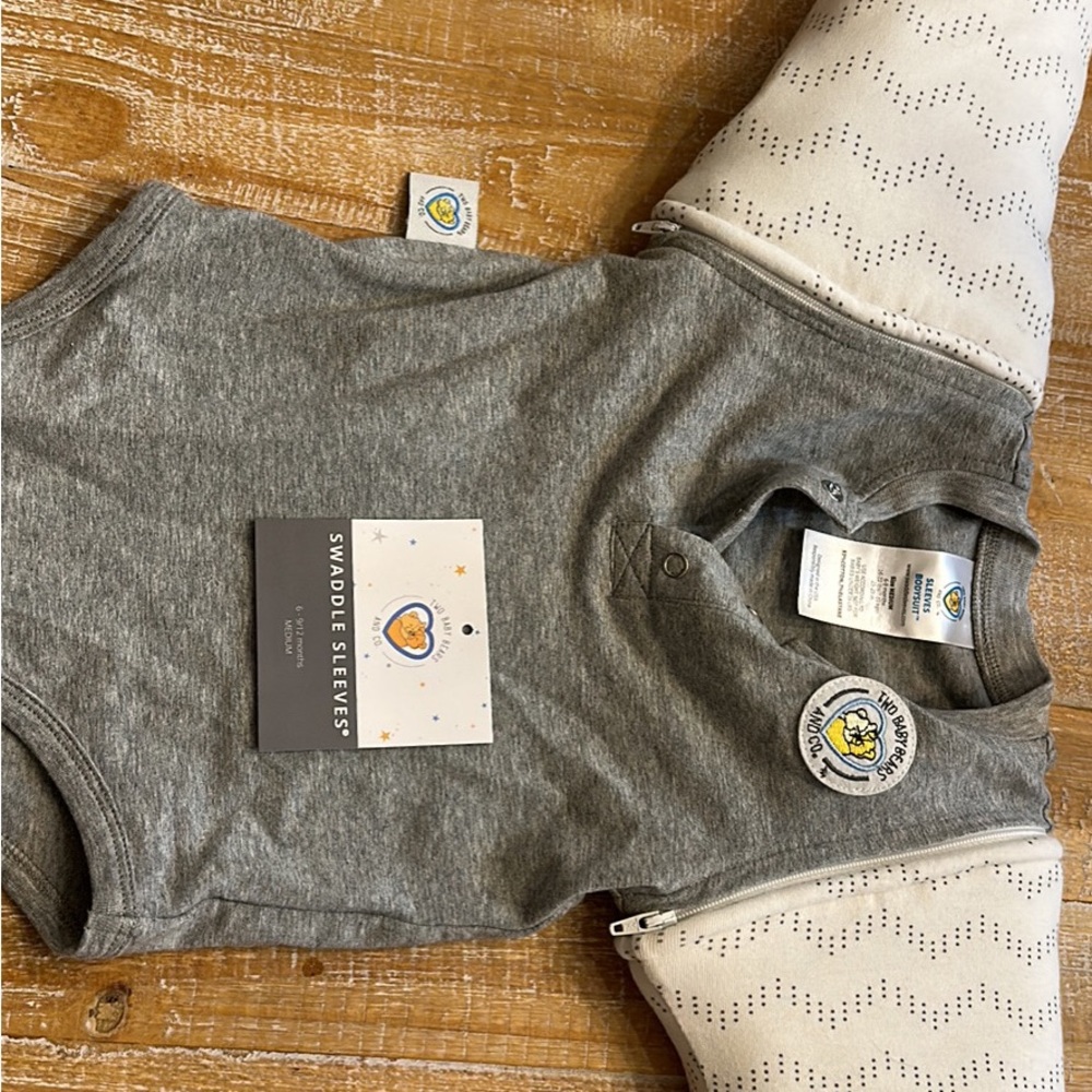 Two baby bears swaddle sleeves bodysuit. This is a swaddle transition
